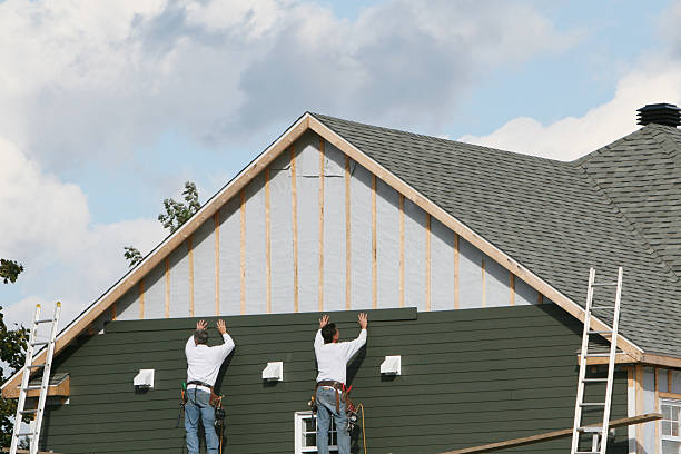 Professional Siding technician working in Hamburg, PA